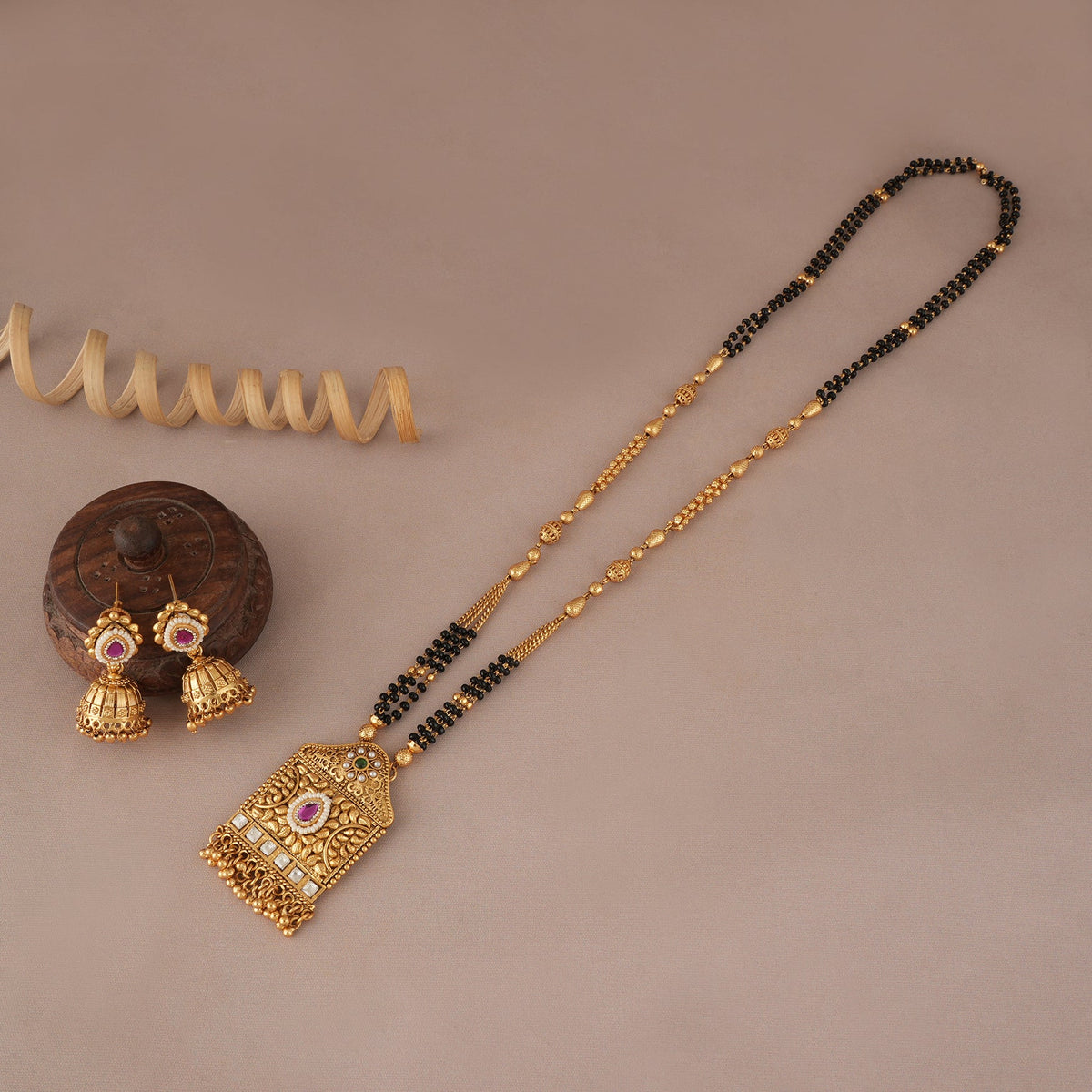 Gorgeous antique gold long mangalsutra with jhumka earring