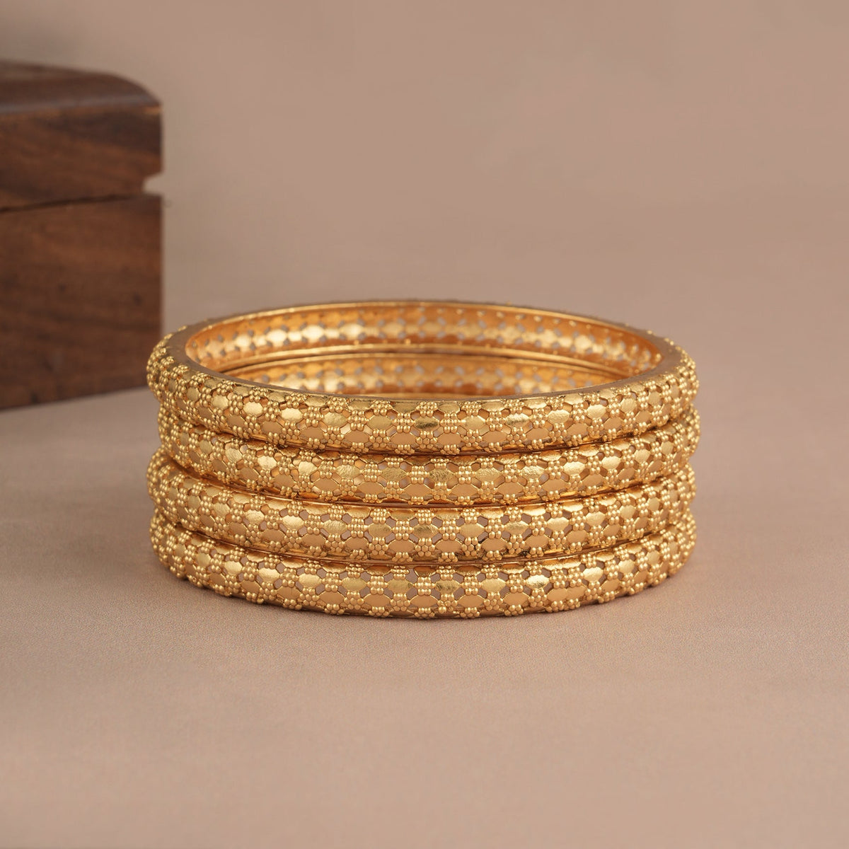Beautiful antique gold plated bangle set for women ( set of 4 )
