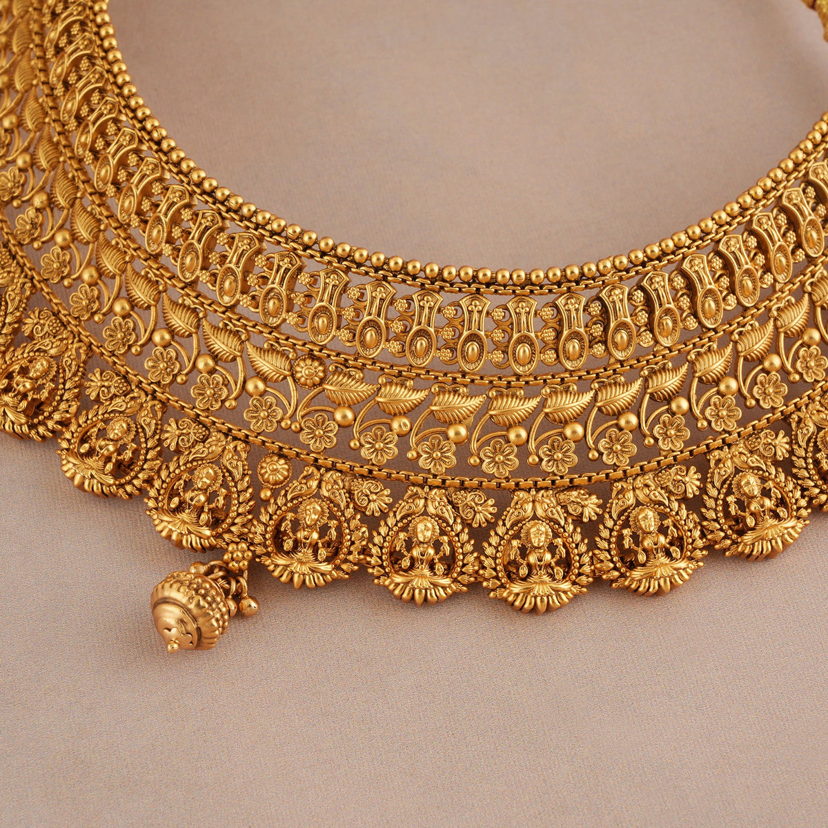 Auspicious antique gold plain intricate maa lakshmi choker necklace set