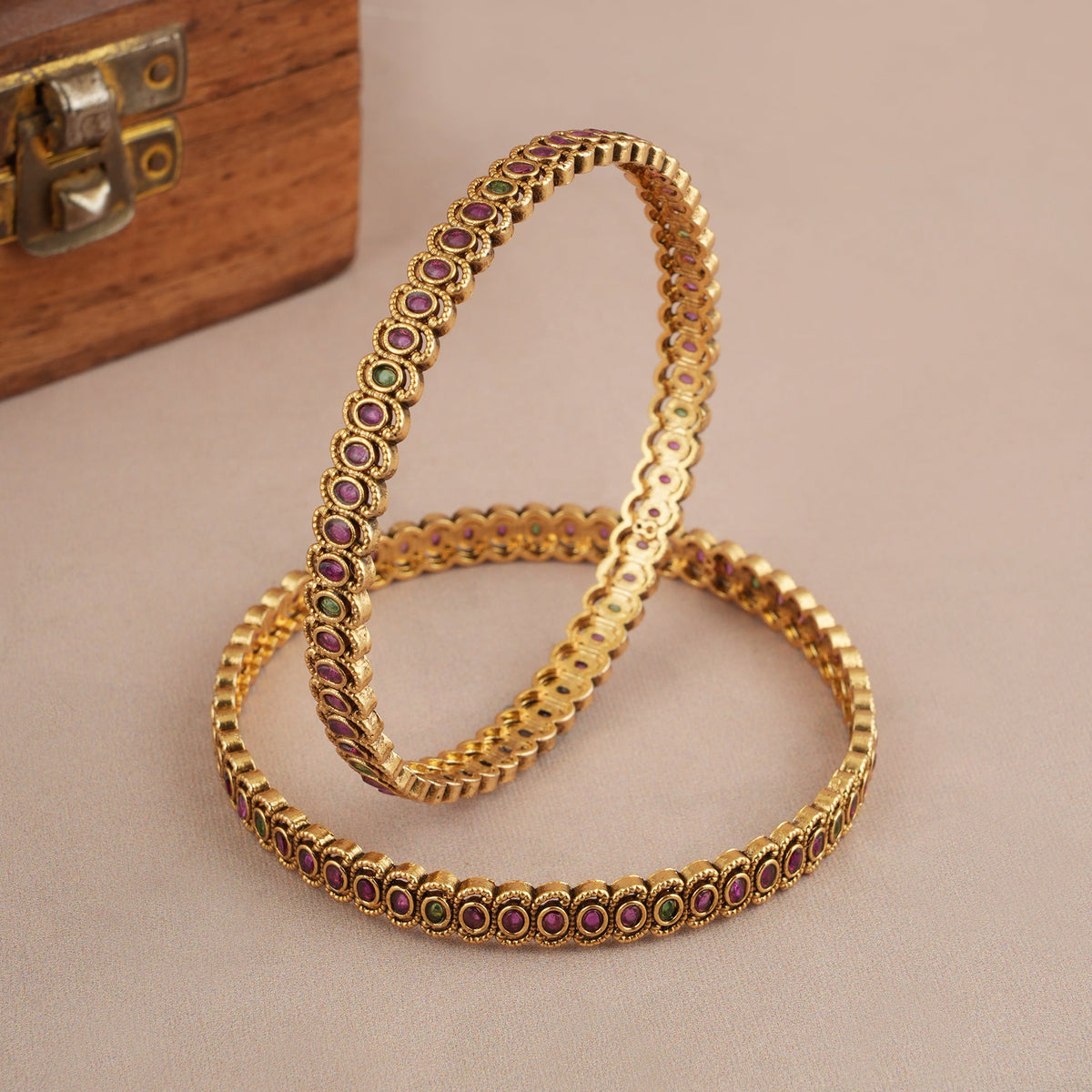 Sleek elegant multicolor antique gold bangle set