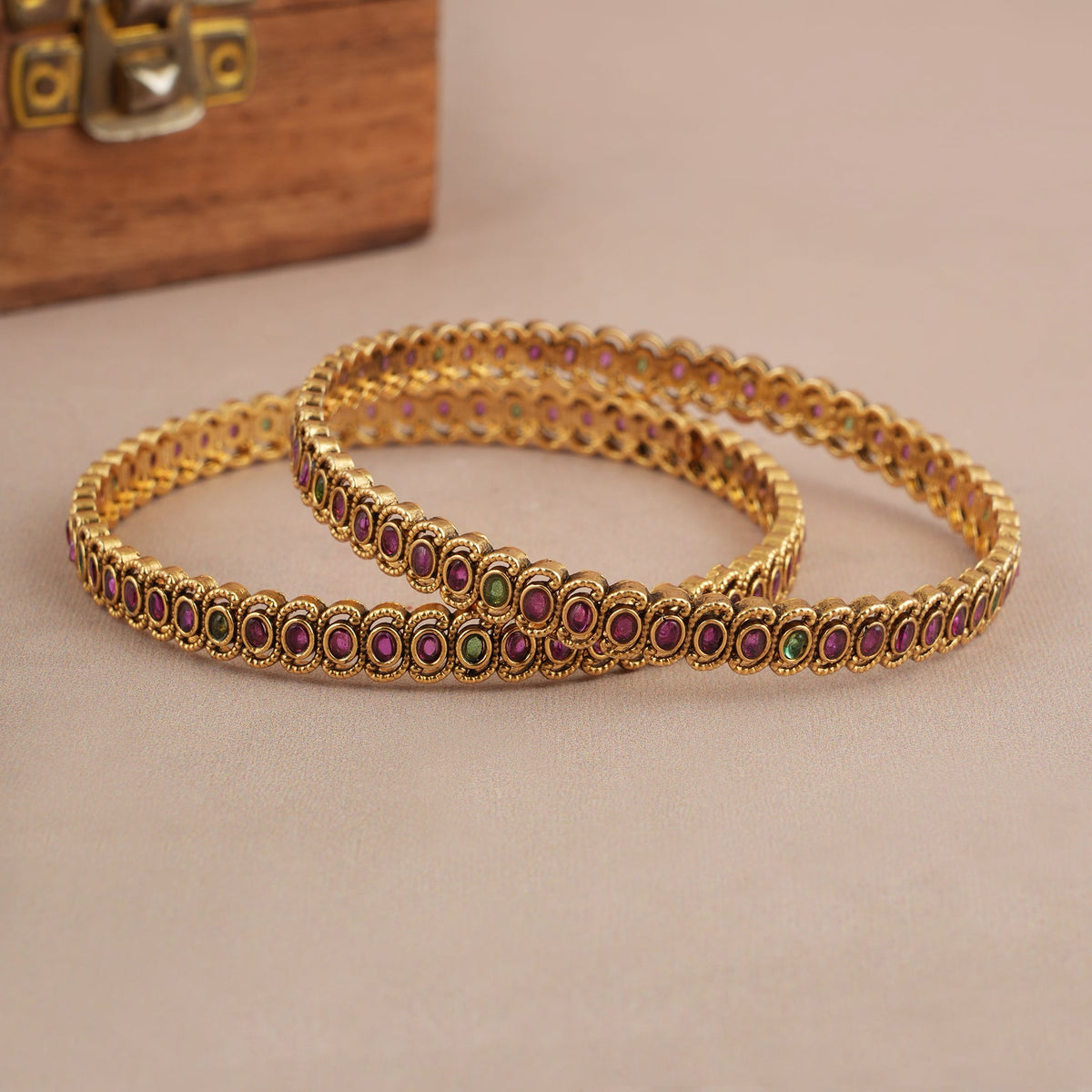 Sleek elegant multicolor antique gold bangle set