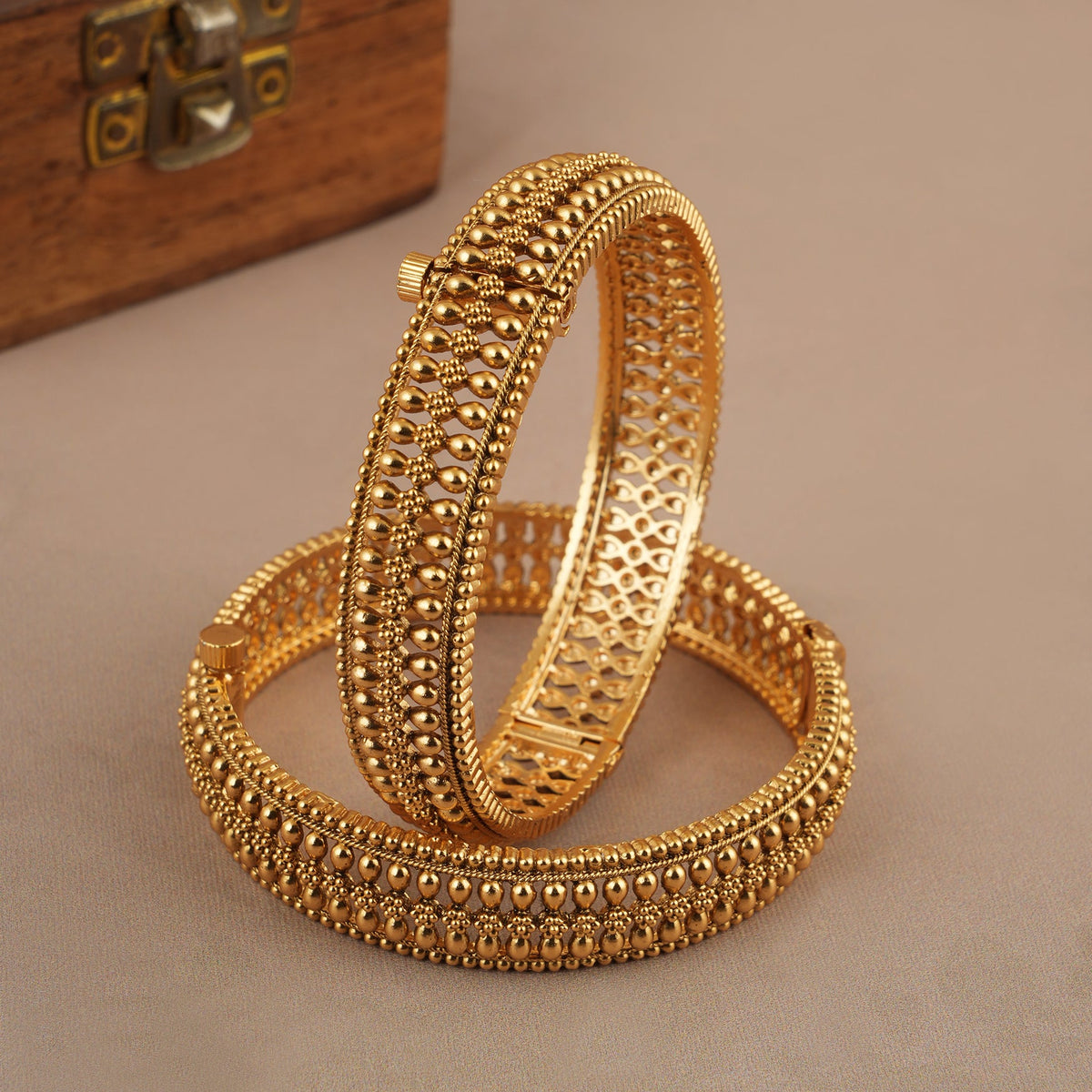 Broad gold plated bangle set