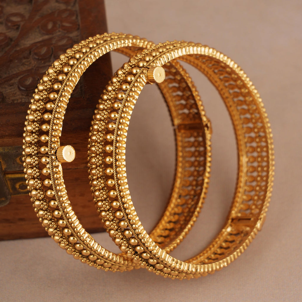 Broad gold plated bangle set