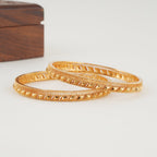 Sleek plain gold bangle set