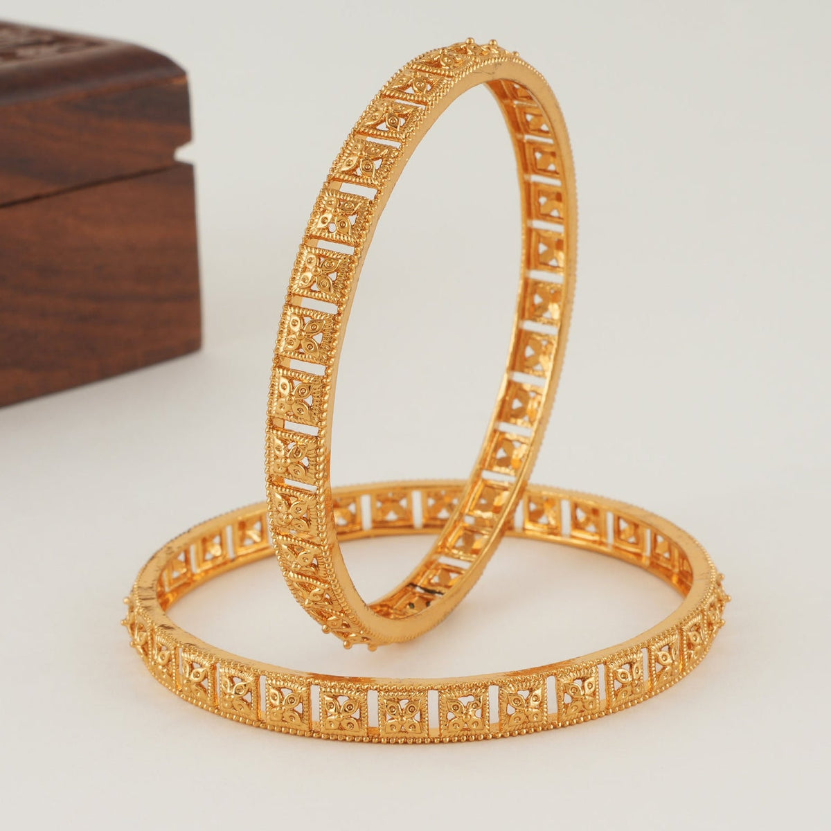 Beautiful plain floral gold bangle set