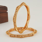 Plain intricate gold bangle set