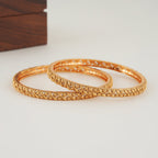 Sleek leaf plain gold bangle set