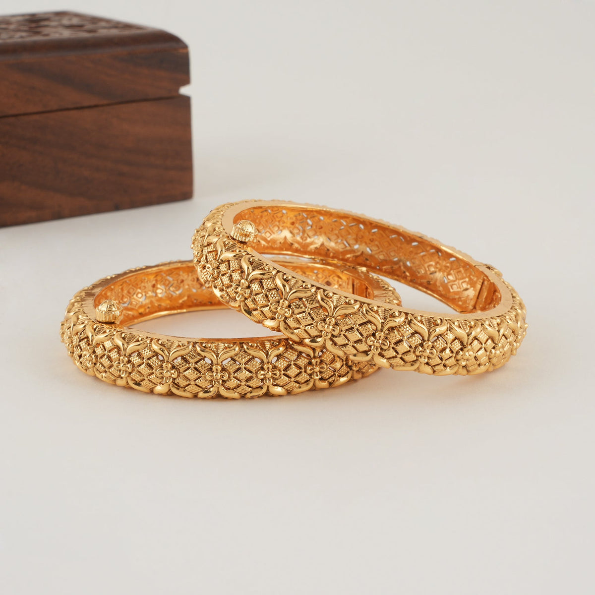 Stunning plain broad gold bangle set