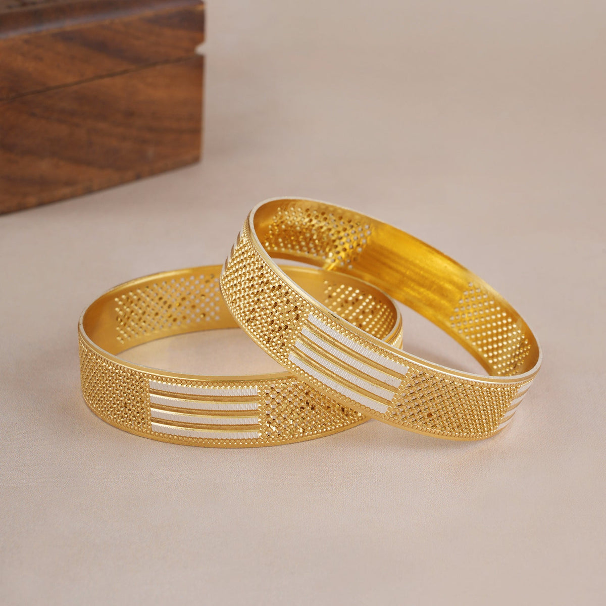 Bold dual tone gold bangle set