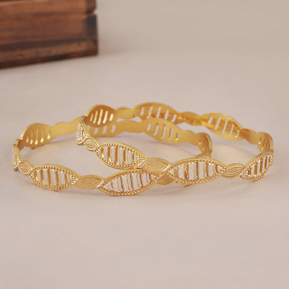 Beautiful dual tone gold plated bangle set